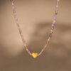 lavender bead layered necklace with gold heart charm