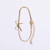 delicate gold bow bracelet