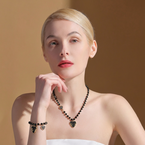 Solisita Black Glitter Leaf Jewellery Set Gold Tone Titanium Steel Monstera Design