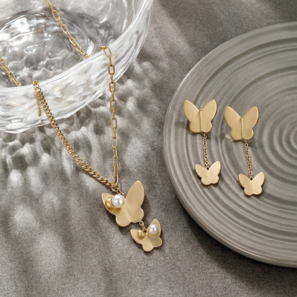 Solisita Matte Gold Butterfly and Pearl Asymmetrical Set Mixed Link Chain Design
