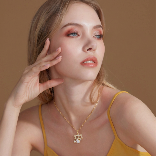 Gold Tone Kitten Pendant with Black Crystal Eyes and Pave Body